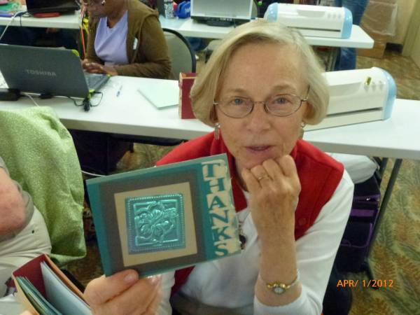 Joanna's embossed metal card