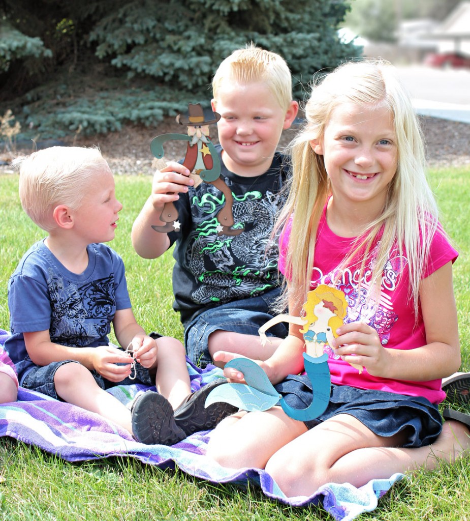 Kids Playing with Paper Dolls