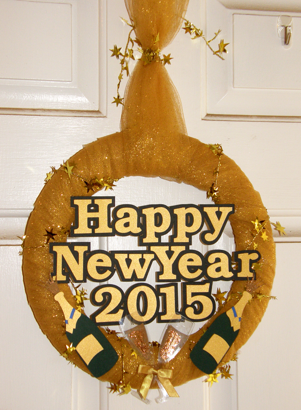 Happy New Year Wreath Decoration. Make your own wreath form from cereal boxes and your electronic die cutter.