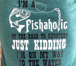 Pazzles DIY Fishaholic Fishing T-shirt with instant SVG download. Instant SVG download compatible with all major electronic cutters including Pazzles Inspiration, Cricut, and Silhouette Cameo. Design by Sara Weber.