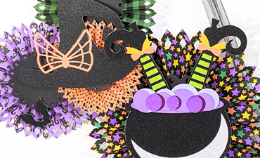 Pazzles DIY Halloween Rosette Hanging Decor with instant SVG download. Compatible with all major electronic cutters including Pazzles Inspiration, Cricut, and Silhouette Cameo. Design by Monica Martinez.