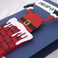 Pazzles DIY Stuck Santa Card with instant SVG download. Compatible with all major electronic cutters including Pazzles Inspiration, Cricut, and Silhouette Cameo. Design by Alma Cervantes.