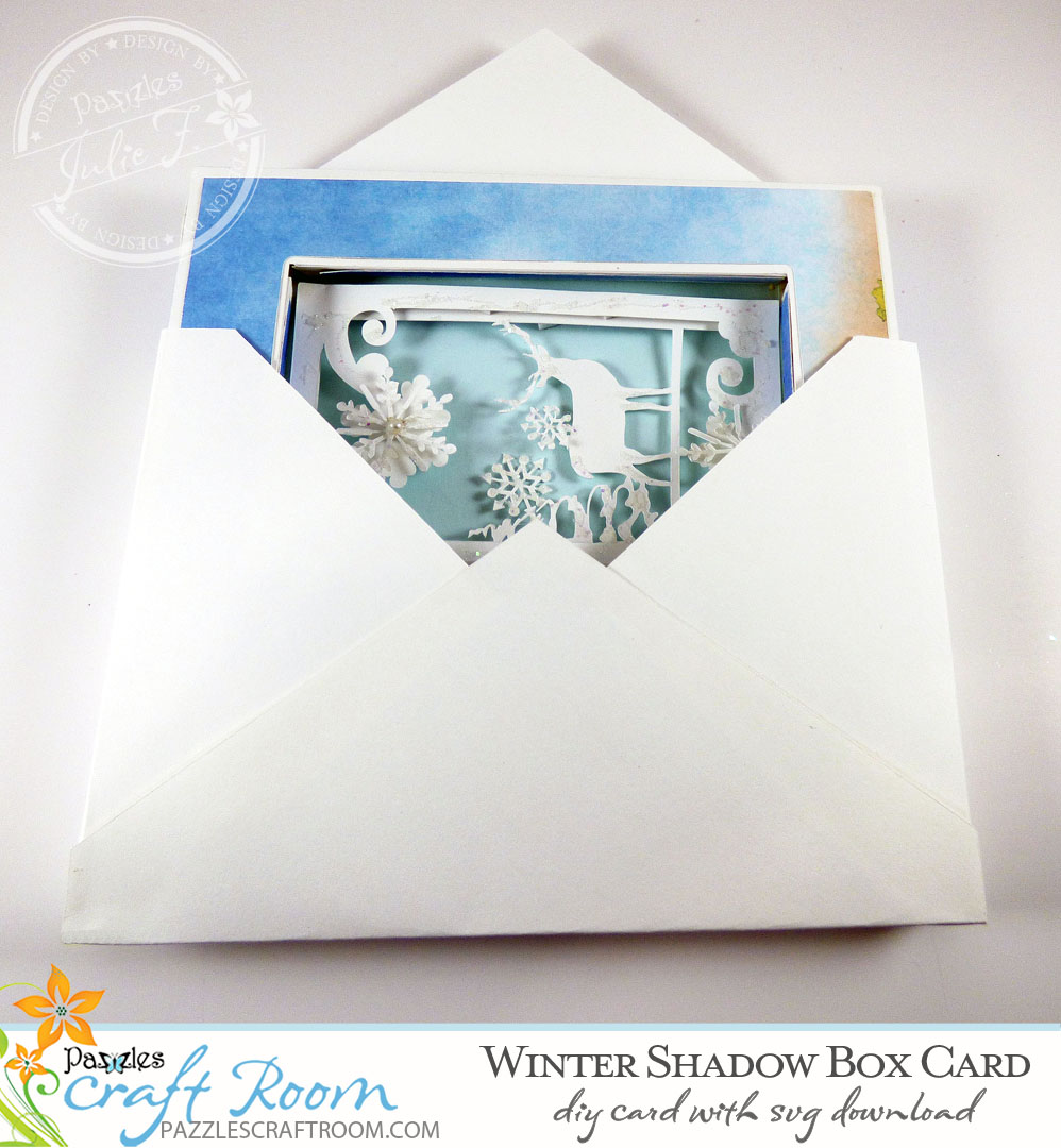 Pazzles DIY Winter Shadow Box Card or Frame with instant SVG download. Compatible with all major electronic cutters including Pazzles Inspiration, Cricut, and Silhouette Cameo. Design by Julie Flanagan.